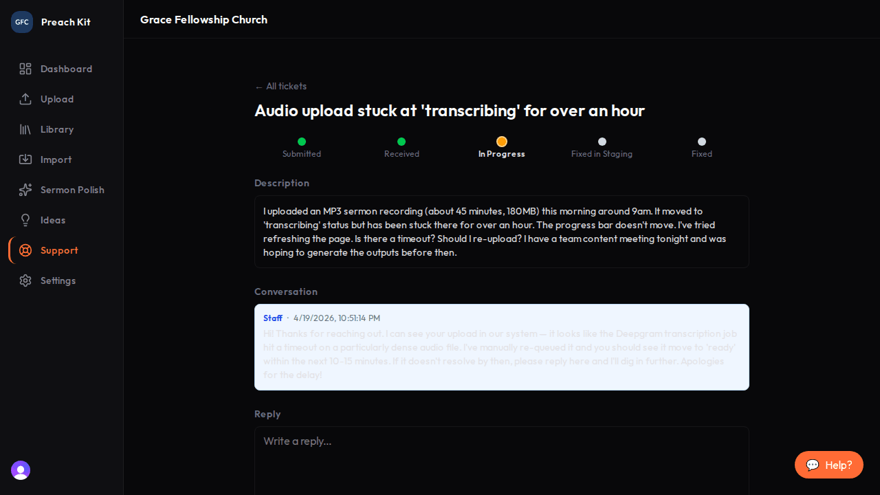 A support ticket detail page showing the original message and a reply from the PreachKit team